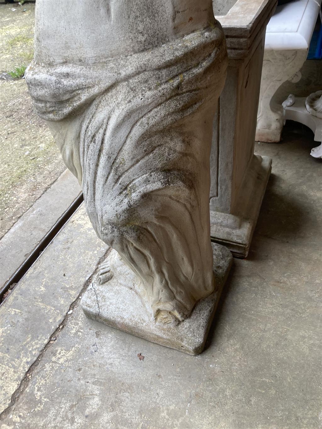 A reconstituted stone garden ornament of Venus on pedestal base, height 192cm